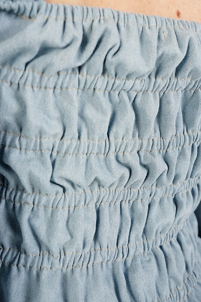 Vintage Denim Blouse with frowning