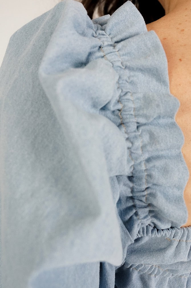 Vintage Denim Blouse with frowning