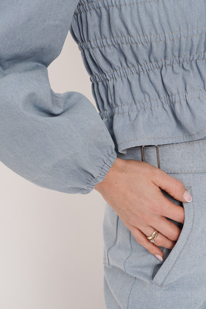 Vintage Denim Blouse with frowning